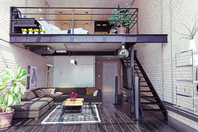 mieszkanie w stylu loftowym z metalowymi schodami